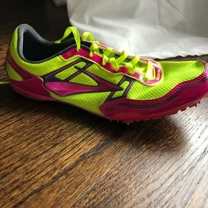 Spike running shoes
